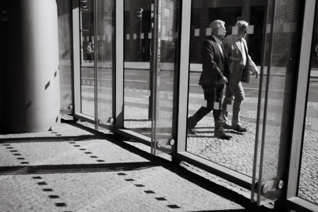 Black and white photo street photography Potsdamer Platz businessmen