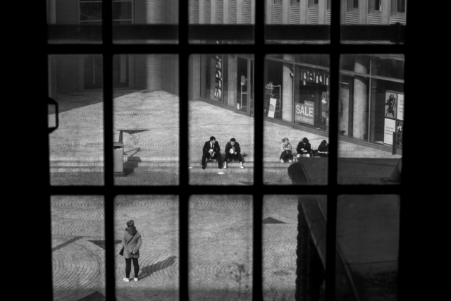 Black and white photo street photography Friedrichstrasse train station